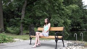 Striking beauty gets her pink cunt entire of warm pee a