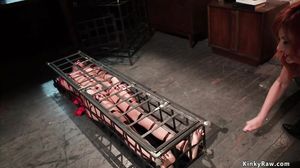 Redhead lezdom whips hot brunette sub