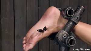 Slut is whipped in doggy device bdsm