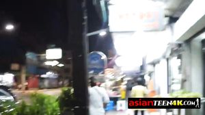 Naughty Asian babe is sucking man's cock