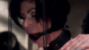 Busty MILF slave sucks huge cock