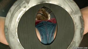 Gagged blonde locked in bird cage