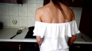 Seducing my horny step sister while she's cooking