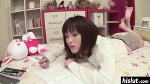 Cute Asian plays with her pussy