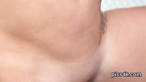 Sultry lesbo chicks get sprayed with pee and squirt wet