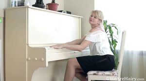 Diana Douglas plays the piano and masturbates