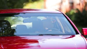 Audrey beauty in red car