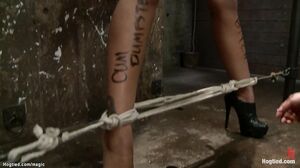 Hogtied lesbian anal hooked on ground