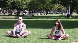 Girl Works Out In A Public Park With Her Boyfriend