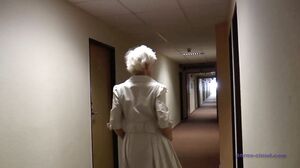Nicol Mandorla - Granny hotel hostess