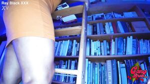 Krystal Davis catches me looking under her dress. Oh, she was looking for a book in the library