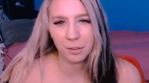 Young Babe Exposes Her Shaved Pussy While Fingering