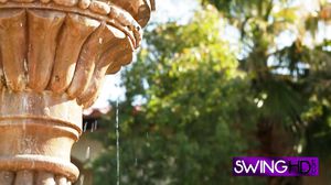 Swingers hang out nacked in the pool.