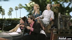 Courtney Page and another girl take turns at drooling on a fat dick