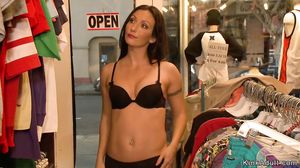 Babe in lingerie and coat in public