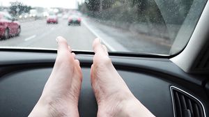 Public Footjob in the car
