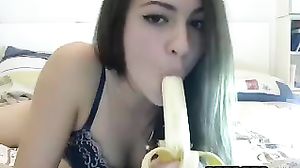 Teen Practices On A Banana