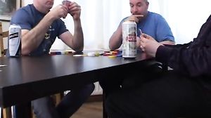 Footjob under table leads to double