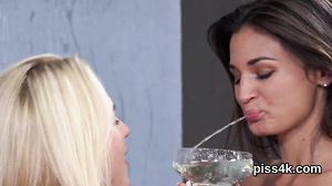 Sensual lesbo girls get covered with piss and ejaculate