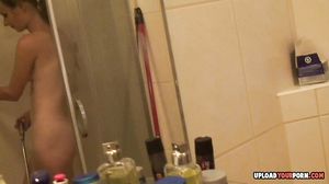Amateur girlfriend fingers herself while taking a shower