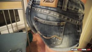 Kinky babe with a tattoo fingers her pussy