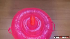 Kinky babe shoves a pink dildo inside