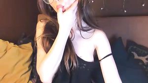 Sexy Girl With Glasses Looks Nice On Cam