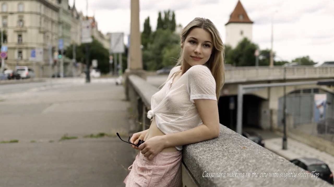 Cassandra - Walking in the city with slightly Sheer Top